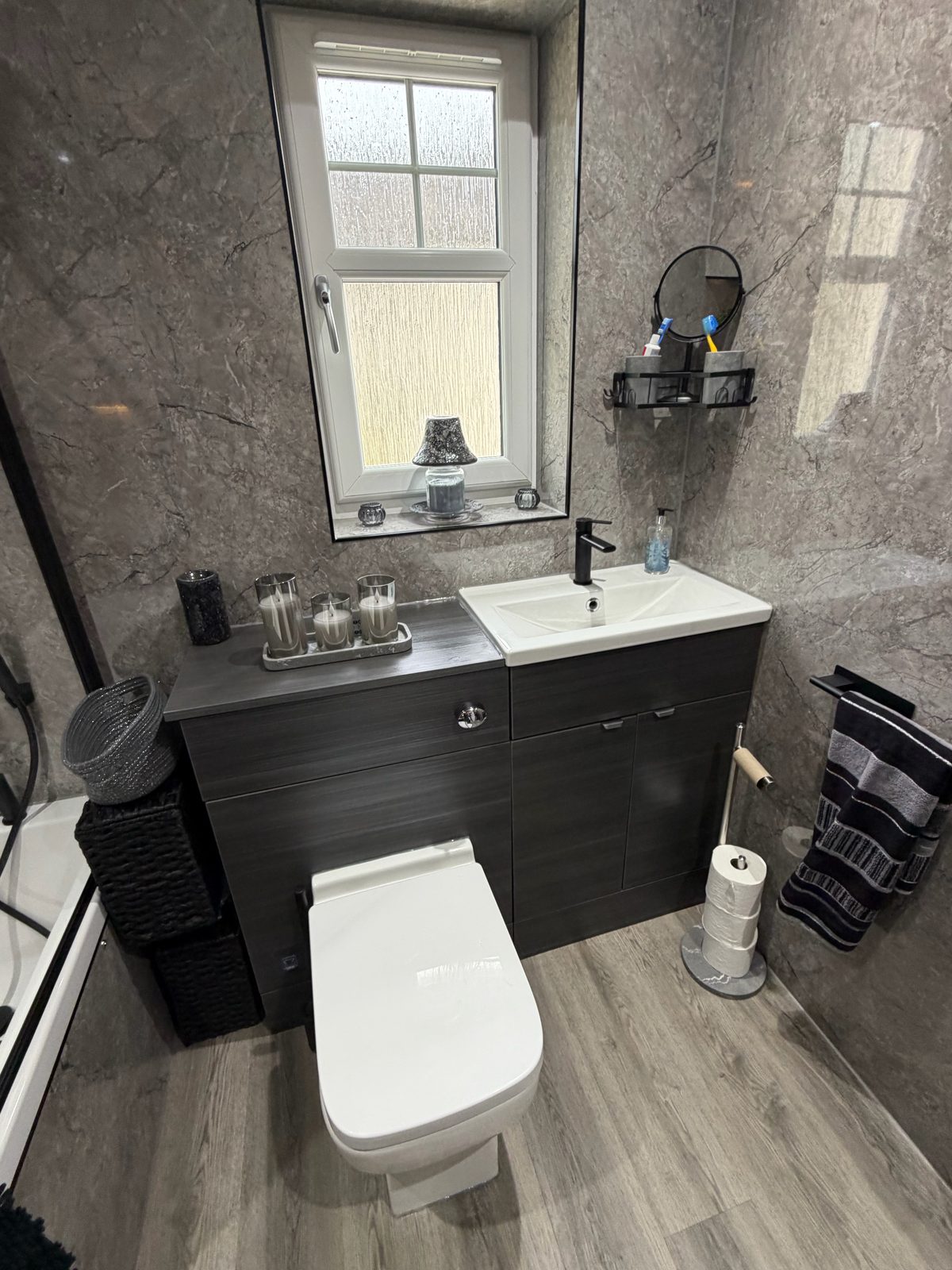 Marble bathroom vanity, WC, window and storage joinery